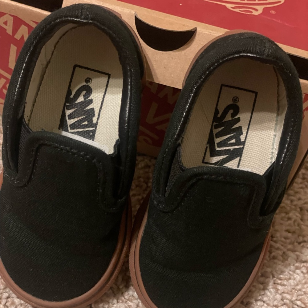 New in box
Vans toddler size 4.5 classic black canvas slip on 
Regular $35